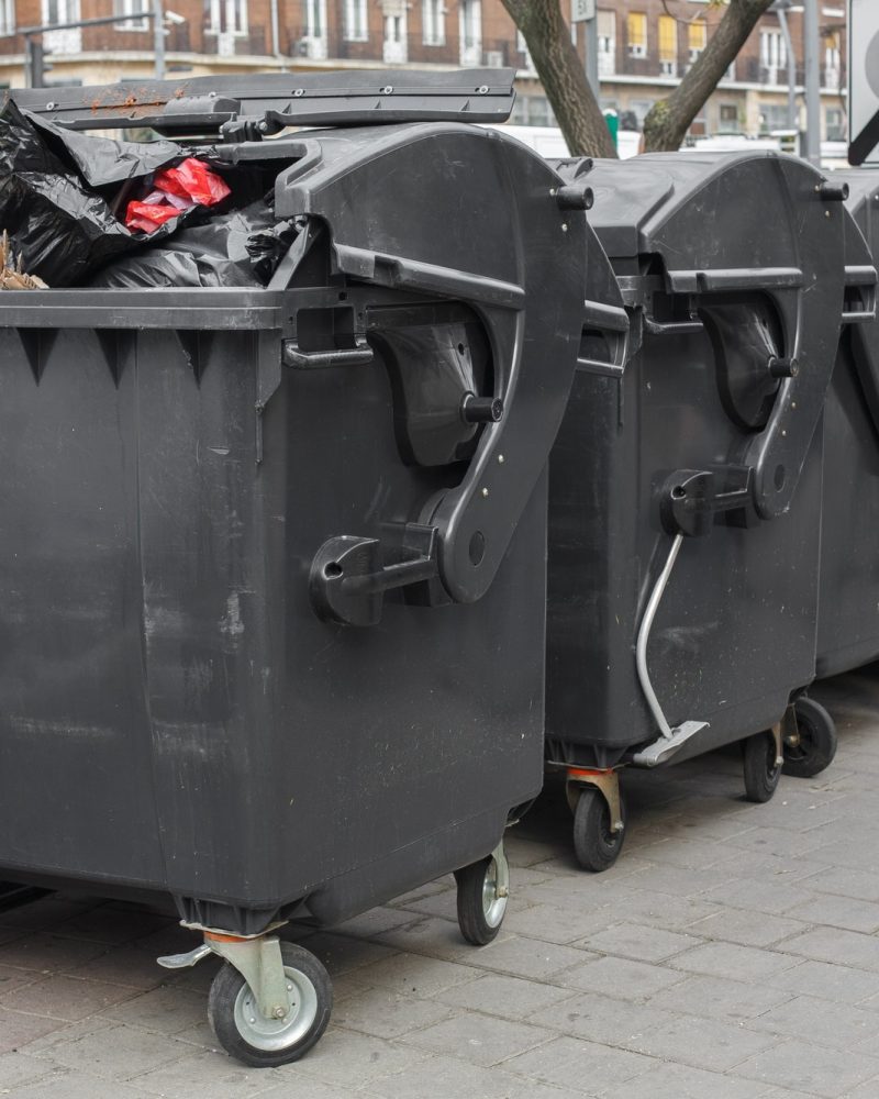 black-plastic-dumpster-street-large-garbage-containers.jpg